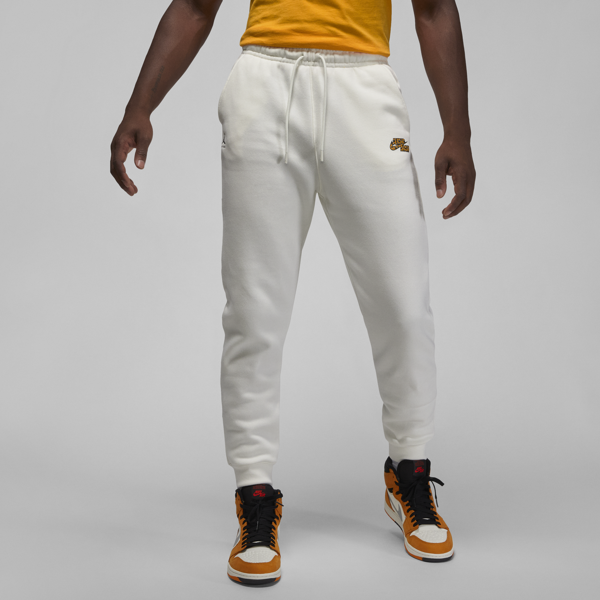 White and gold online nike sweatpants