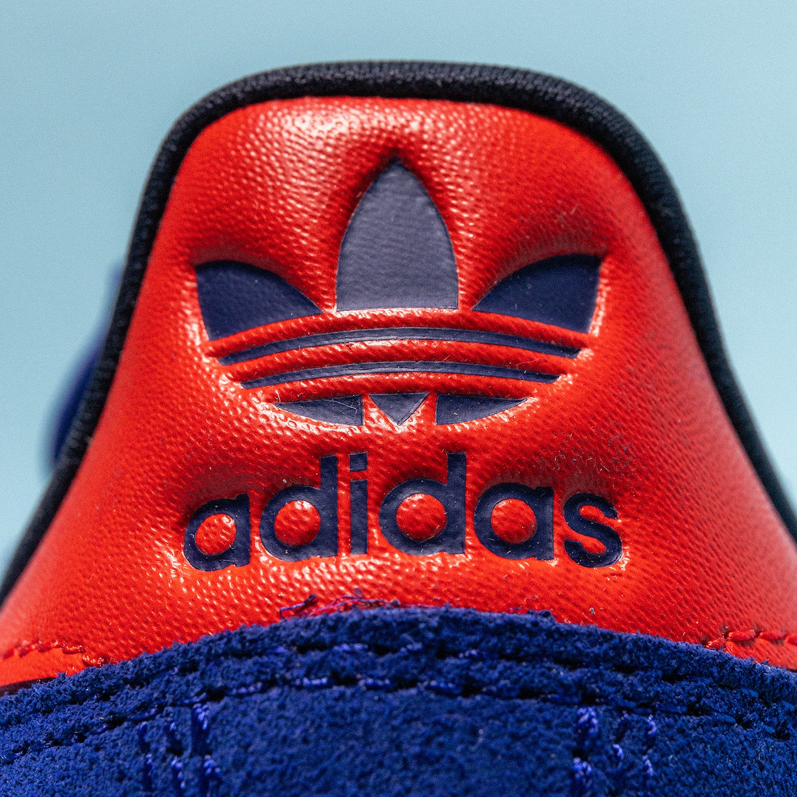 Adidas trainers blue hot sale and red